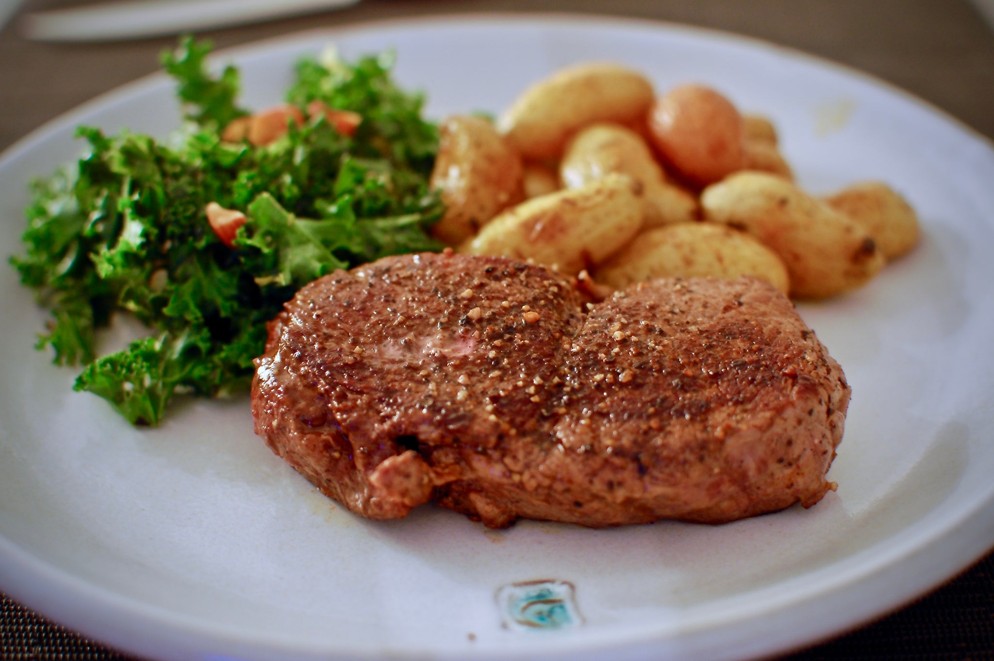 Bison Filet with Roasted Fingerlings & Kale Salad